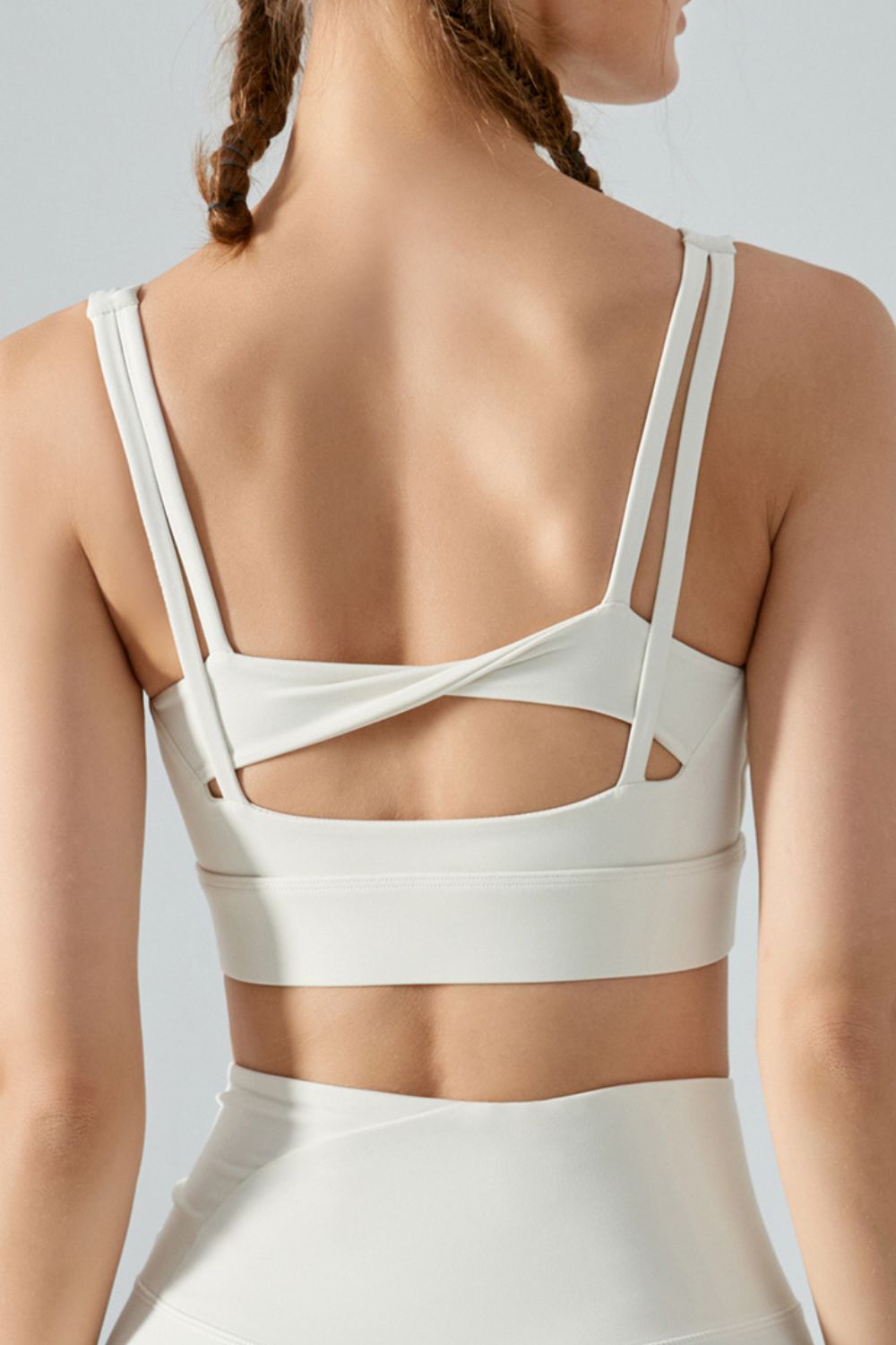 Faux Layered Twist Back Cutout Sports Bra Trendsi